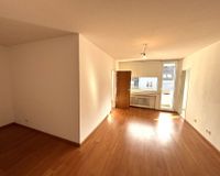 Wohnzimmer mit Balkon